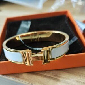 Hermès White and Gold Bracelet